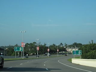 Curving east onto Bienville Boulevard, U.S. 90 meets MS 609 north at Washington Avenue.