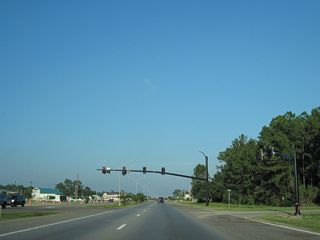 Ocean Springs Road formerly was a continuous road angling across U.S. 90. A safety improvement project realigned Ocean Springs Road into two separate, 90-degree intersections.
