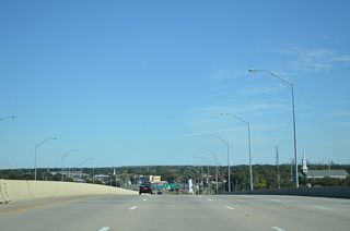 Replacing a four lane drawbridge, the eight-lane wide Jackson County Veterans Memorial Bridge spanning the Pascagoula River opened in 2002.