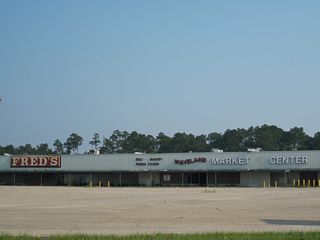 The shuttered Waveland Market Center retail plaza at the southeast corner of U.S. 90 and Waveland Avenue was demolished after 2010.