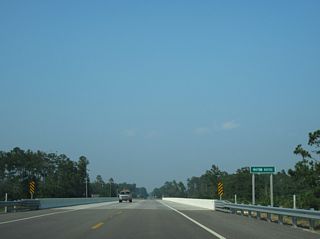 U.S. 90 spans Whites Bayou between 11th Avenue and Jenness Road at Pearlington.