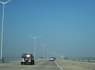 With the completion of the westbound lanes (LaFontaine, 2007c), the St. Louis Bay Bridge fully opened to traffic on January 4, 2008 (Mississippi Press, 2008).