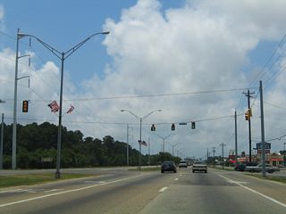 Chicot Road north 0.32 miles to Shortcut Road west is part of unsigned MS 611. MS 611 follows Shortcut Road west 0.46 miles to MS 611 (Telephone Road) at Catalpa Avenue.