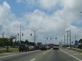 Hospital Road branches 0.54 miles south from MS 613 (Telephone Road) to intersect U.S. 90 (Denny Avenue) adjacent to Singing River Hospital.