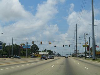 Market Street connects U.S. 90 (Denny Avenue) with MS 613 (Telephone Road) 0.17 miles to the north. North into Moss Point, MS 613 represents one of two bridges crossing the Escatawpa River to I-10.