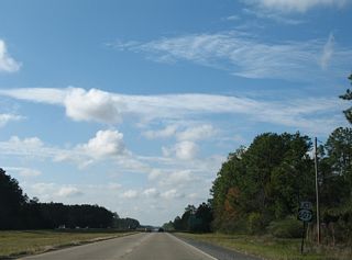 Prior to 2012, U.S. 90 turned southwest from the beginning of MS 607 at an angled intersection.