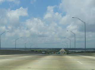 U.S. 90 lowers from the Pascagoula River bridge onto a six lane causeway leading to the West Pascagoula River.
