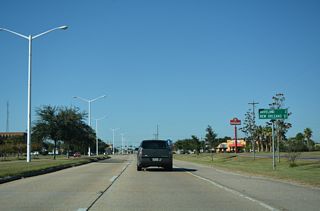 Distance sign posted west of Ulman Avenue.