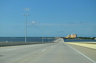 The Biloxi Bay Bridge crests at 95 feet. The 120 foot wide deck accommodates six overall lanes of traffic and a multi use trail along the south side (LaFontaine, 2007).