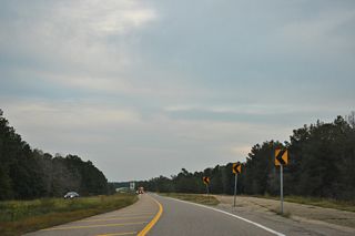 U.S. 98 crosses the Escatawpa River east into Alabama. The eastbound span was constructed by MDOT well in advance of the eventual four laning of U.S. 98 in Mobile County.