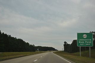 A diamond interchange connects U.S. 98 with the expressway along MS 63 to the northwest of Lucedale.