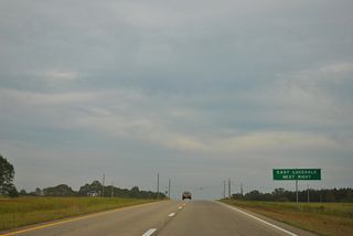 Signed as the route into East Lucedale, Old MS 63 meets U.S. 98 at an RCUT intersection.