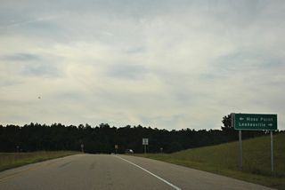 The expressway taking MS 63 south from U.S. 98 opened in November 2000 as part of planned four lane corridor linking Moss Point and the Mississippi Gulf Coast with U.S. 45 at State Line.