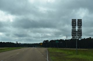 Despite some remaining signage referencing the overlap, U.S. 98 formerly ran west alongside U.S. 84 to Natchez.