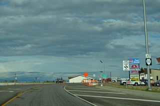 S-213 heads south from the settlement of Santa Rita to meet U.S. 2 (Main Street) in Cut Bank.