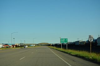 Roosevelt Highway narrows to a two lane, rural highway west of Interstate 15 and Shelby.