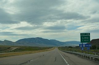 Exit 15 connects Interstate 15 north with Bailey Street at the town of Lima in one mile.
