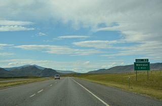 Camp Creek Road connects Interstate 15 with Old Highway 91 and the rural community of Melrose west of forthcoming Exit 93.