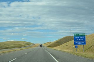 The Divide Rest Area and associated weigh station follows mile marker 108 along Interstate 15 northbound.