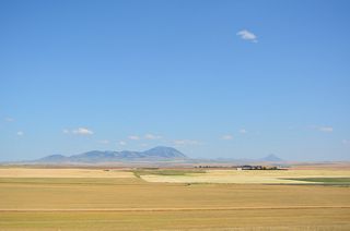 Middle Butte, East Butte and West Butte. West Butte is the closest and highest to Sweet Grass.