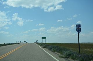 Potter Road stems one mile west from Oilmont South Road in rural Toole County to meet Interstate 15 at Exit 373.