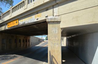 Painted shields on the Main Street Overpass predated the relocation of U.S. 12 onto I-94 and the truncation of U.S. 10 east from Montana in 1986.