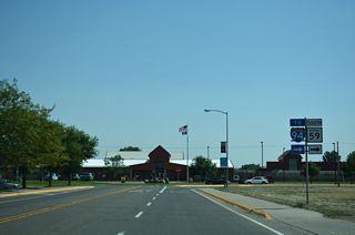MT 59 at the southern turn from the end of Main Street onto Haynes Avenue.