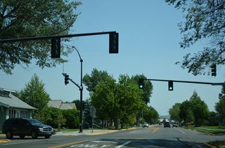 Strevell Avenue intersects MT 59 (Main Street) in the Miles City residential street grid north of Wibaux Park.