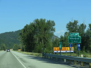 The diamond interchange with Big Creek Road at Exit 16 is located at the unincorporated community of Haugan by the Savenac Historic Tree Nursery.
