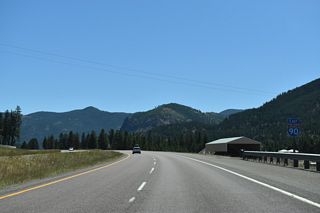 Leaving the diamond interchange (Exit 75) with Montana Secondary Highway 507/Business Loop I-90 (Railroad Avenue), Interstate 90 travels 1.2 miles through the town limits of Alberton.