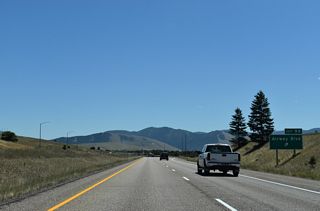 A modified diamond interchange joins I-90/U.S. 93-MT 200 with Airway Boulevard at Exit 99.