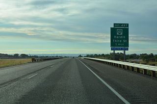 The first of two exits for the city of Hardin is joins I-90/U.S. 87-212 with Business Loop I-90 (3rd Street) west and Sugar Factory Loop north.