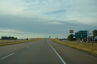 Exit 514 departs I-90/U.S. 87 west for the settlement of Garryowen. Old U.S. 87 comprises the west side frontage road along this stretch of freeway.