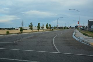 Business Loop I-90/MT 47 curve south from 14th Street W to overtake Center Avenue at 13th Street.