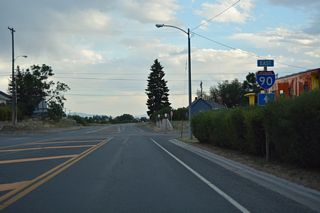 Business Loop I-90 transitions into a rural highway south from Conley Avenue on the return to Interstate 90.