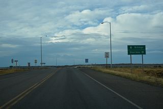 Business Loop I-90 east reconnects with I-90/U.S. 87-212 just north of S-384.