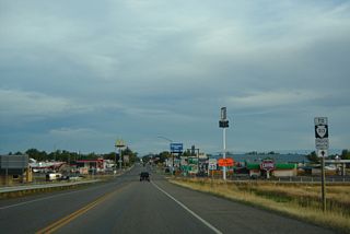 S-313 follows the Bighorn River south from Hardin to Crow Country and Fort Smith. Crawford Avenue south to Mitchell Avenue is the truck bypass along the west side of Hardin.