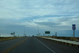 Crawford Avenue leads into the diamond interchange with I-90/U.S. 87-212 at Exit 495 north just beyond Park Road.