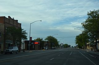 Business Loop I-90 and MT 47 are unmarked along Center Street leading north from 3rd Street and S-313.