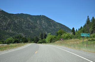 Business Loop I-90/S-507 follow Adams Street west into the Alberton town limits.