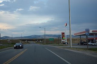 The north end of Business Loop I-90 is a diamond interchange joining Main Street and Sam Beck Lane with Interstate 90.