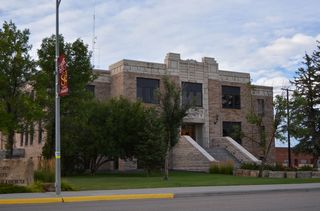 The Big Horn County Courthouse lies two blocks west of Business Loop I-90/MT 47 at Center Avenue along 3rd Street W.