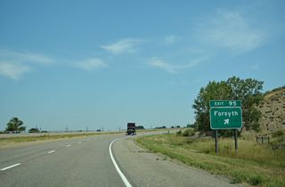 18th Avenue intersects Front Street (Old U.S. 10/12/312) to the immediate north of Interstate 94 before crossing the BNSF Railroad ahead of Main Street west to Downtown Forsyth.