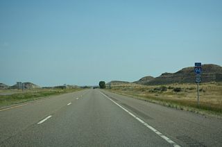 Confirming markers for I-94/U.S. 12 posted east of Business Loop I-94 north into Miles City.