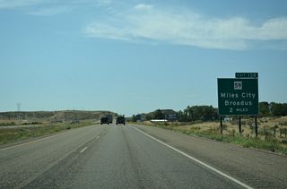 I-94/U.S. 12 straddle the bluffs rising to the east of Miles City southwest to Carbon Hill and Exit 138 with MT 59 (Haynes Avenue).