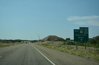 U.S. 12 combines with Interstate 94 west to bypass Miles City while Business Loop I-94 follows the previous route to the city center.