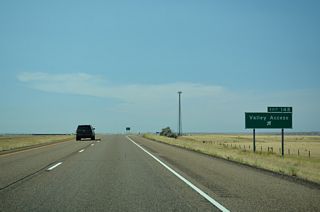 Old U.S. 10 ties into the diamond interchange at Exit 148 from the east.