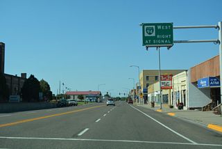 Business Loop I-94 turns north onto Towne Street in Downtown Glendive two blocks from this overhead by Clement Street.