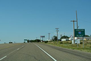 Business Loop I-94 returns to Interstate 94, 0.73 miles southwest of CR 261.