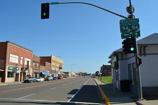 The north end of S-335 (Merrill Avenue) at Business Loop I-94 (Towne Street) in Downtown Glendive.